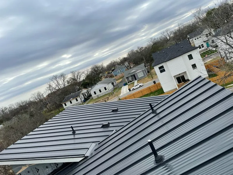 Standing seam metal roof panels with vents for Skylight Repair in Crowley